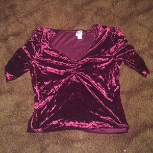 It is a red velvet crop top